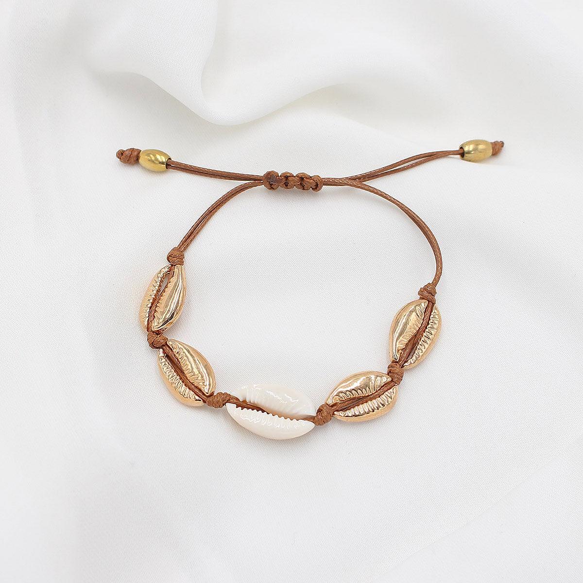 Гривна PUKA ONE WHITE / GOLD